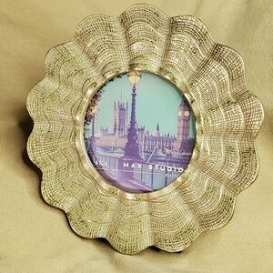 Beautiful Round Gold Tone Frame